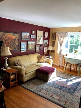211 Westhampton Road Northampton, MA 01062 - Photo 6 of 21 a living room with furniture and a floor to ceiling window