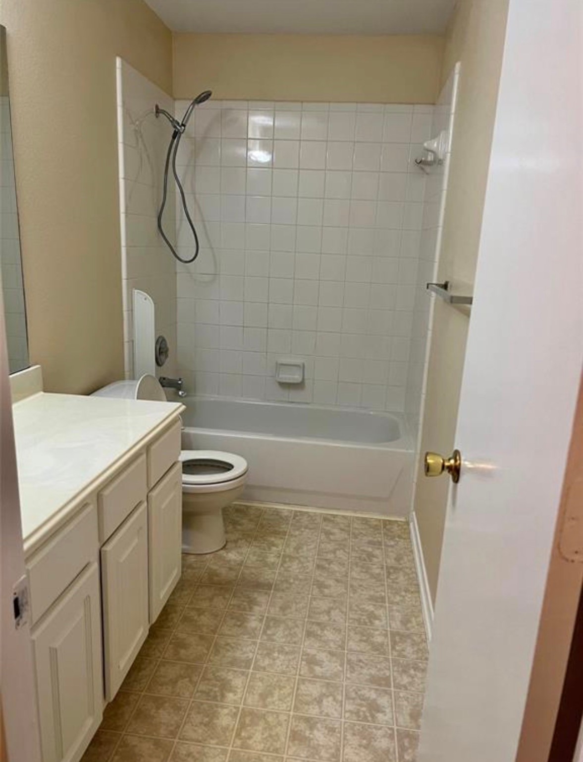 12206 Beacon Tree Court Humble, TX 77346 - Photo 15 of 25 a bathroom with a granite countertop sink toilet and shower