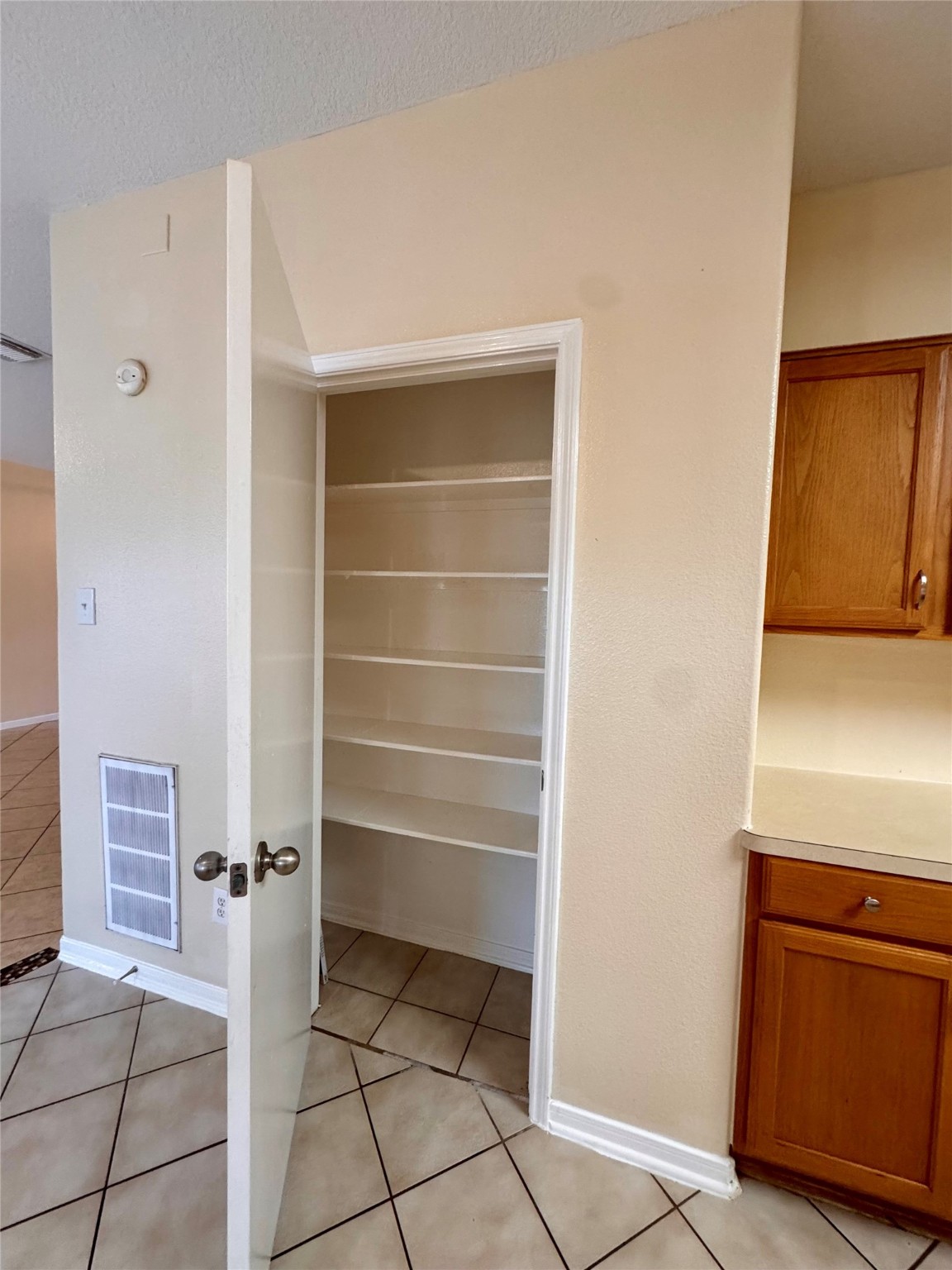 12206 Beacon Tree Court Humble, TX 77346 - Photo 8 of 25 a view of walk in closet with empty racks