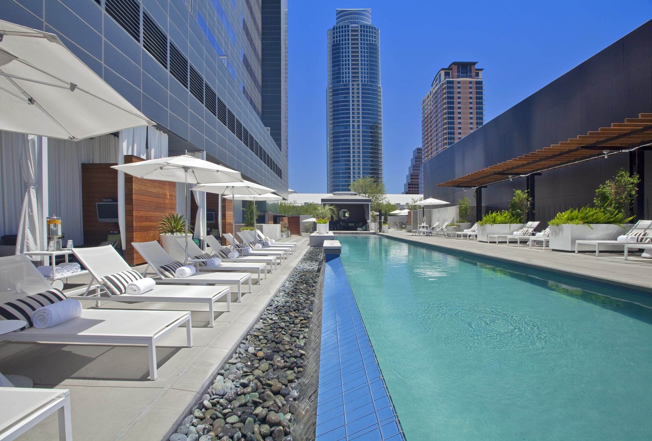 210 Lavaca Street, Unit 2203 Austin, TX 78701 - Photo 13 of 30 Community pool with a patio area and a city view