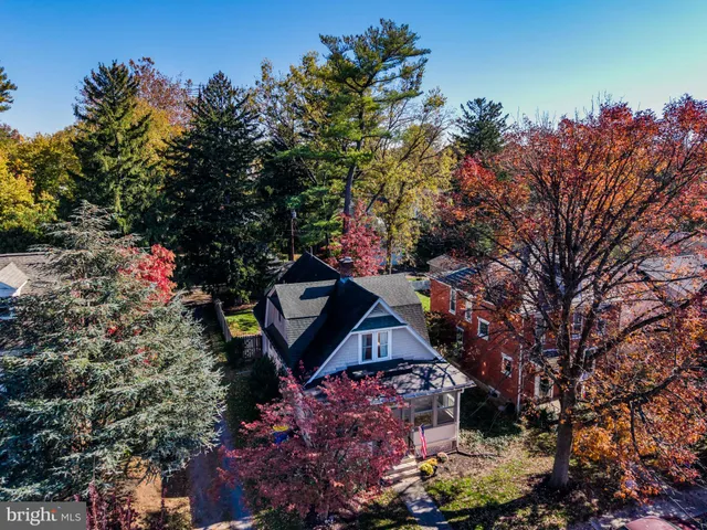 a view of a backyard of a house with a yard