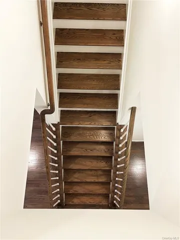 a black and white photo of a bench