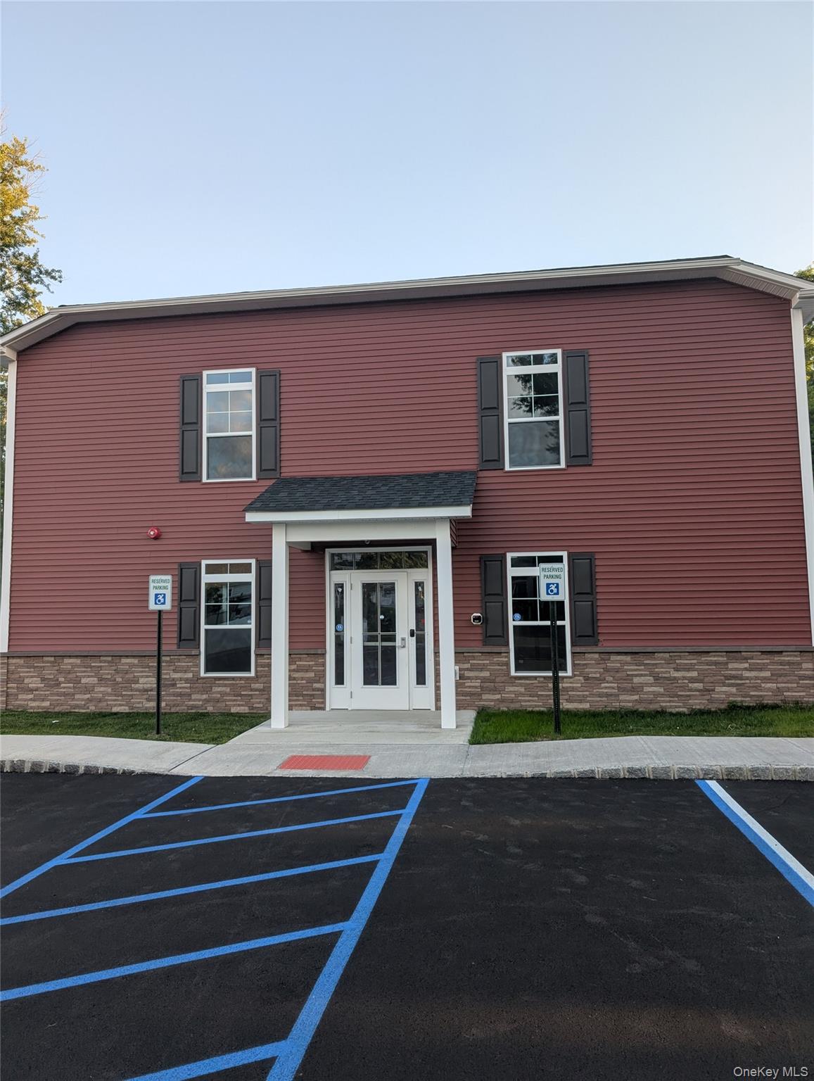 69 Magnolia Park Road Middletown, NY 10940 - Photo 38 of 43 View of clubhouse featuring uncovered parking