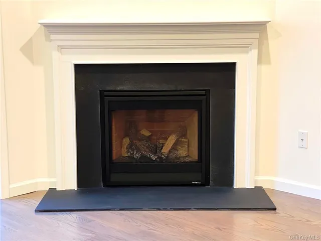 a living room with a fireplace