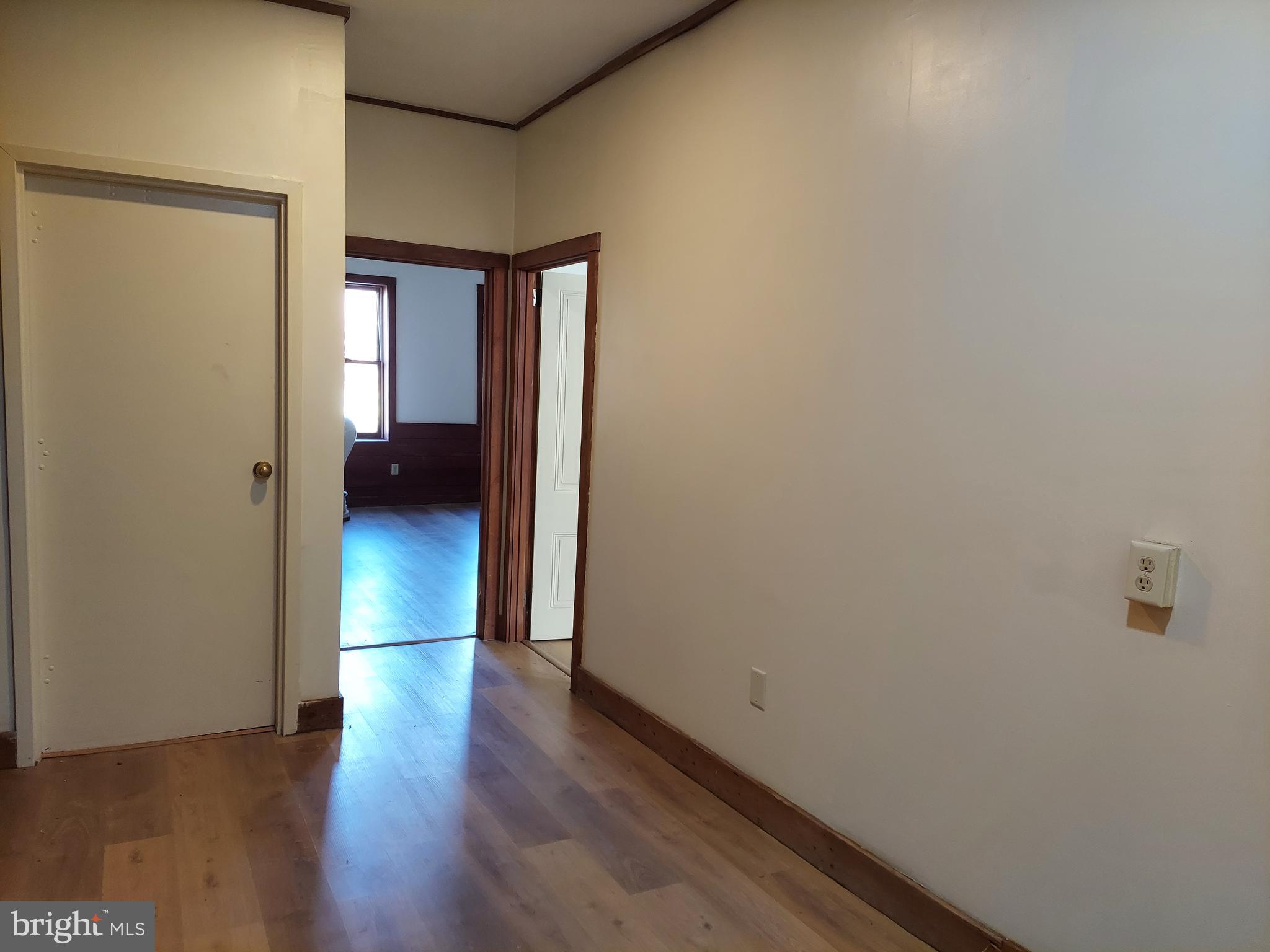 264 West Market Street, Unit 2 York, PA 17401 - Photo 5 of 12 a view of a room with wooden floor and closet