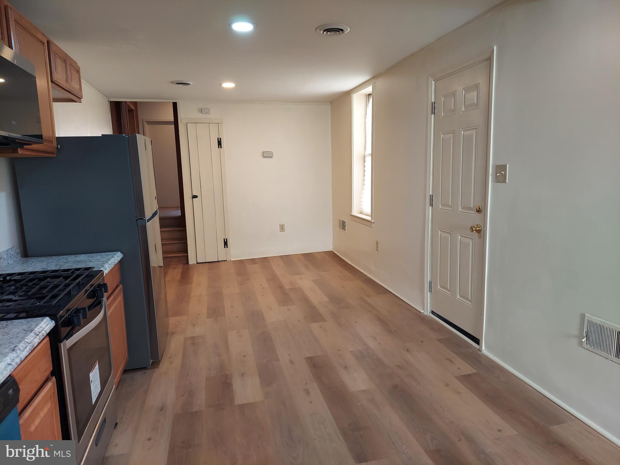 264 West Market Street, Unit 2 York, PA 17401 - Photo 10 of 12 a view of a kitchen with wooden floor and a sink