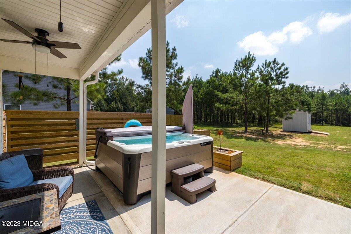249 Davis Road Gray, GA 31032 - Photo 27 of 53 a view of a swimming pool with a patio and a yard