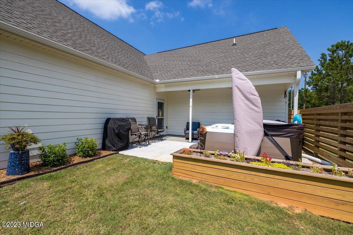 249 Davis Road Gray, GA 31032 - Photo 30 of 53 a view of house with outdoor seating