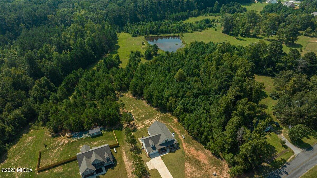 249 Davis Road Gray, GA 31032 - Photo 36 of 53 an aerial view of residential house with outdoor space and trees all around