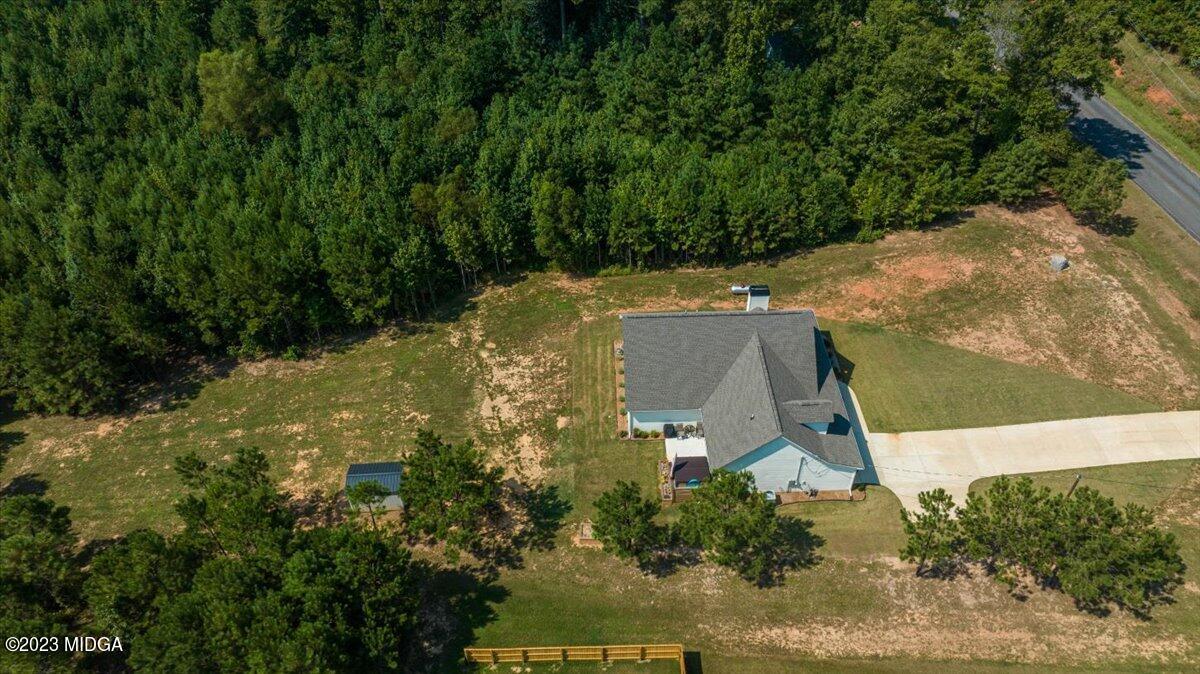 249 Davis Road Gray, GA 31032 - Photo 39 of 53 an aerial view of a house with a yard