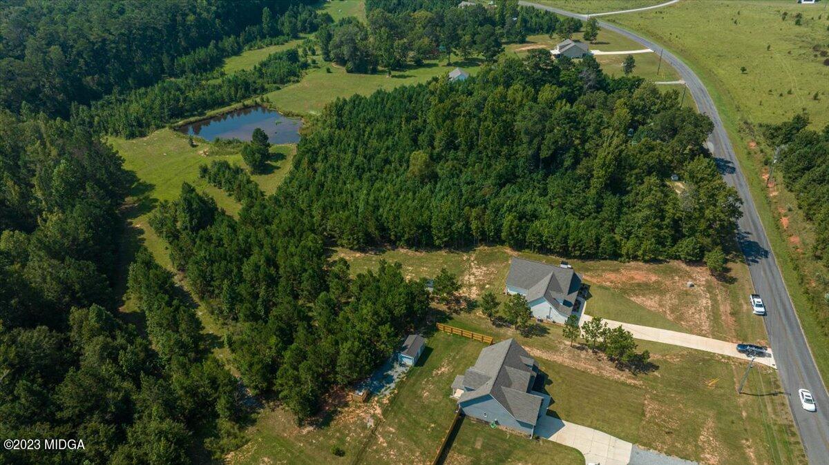 249 Davis Road Gray, GA 31032 - Photo 40 of 53 an aerial view of residential house with outdoor space and trees all around