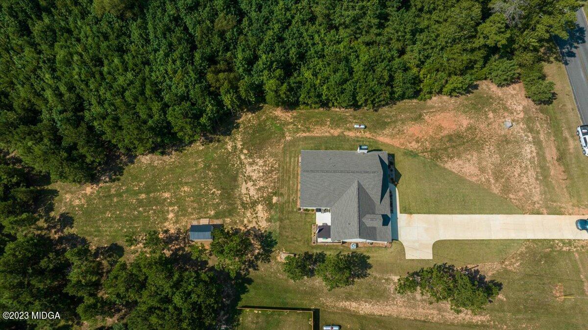 249 Davis Road Gray, GA 31032 - Photo 41 of 53 a aerial view of a house with a yard