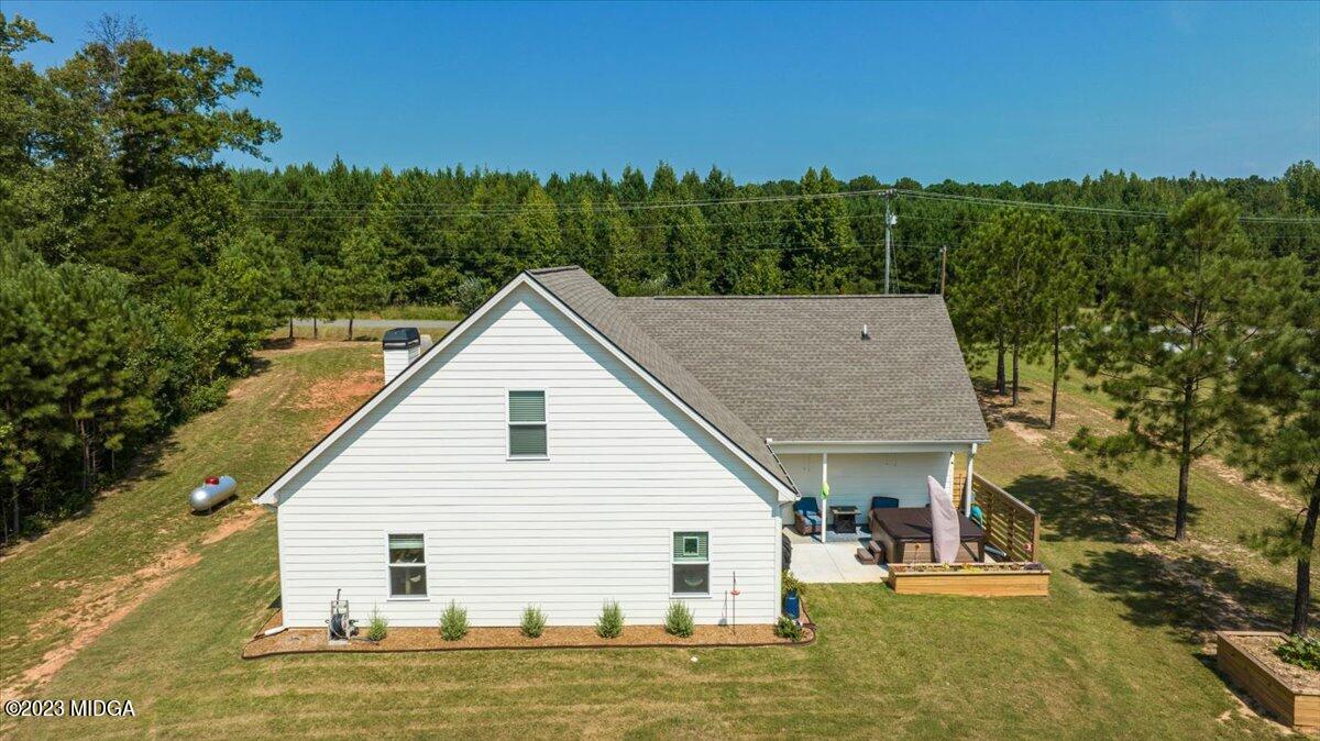 249 Davis Road Gray, GA 31032 - Photo 44 of 53 a view of a house with a yard