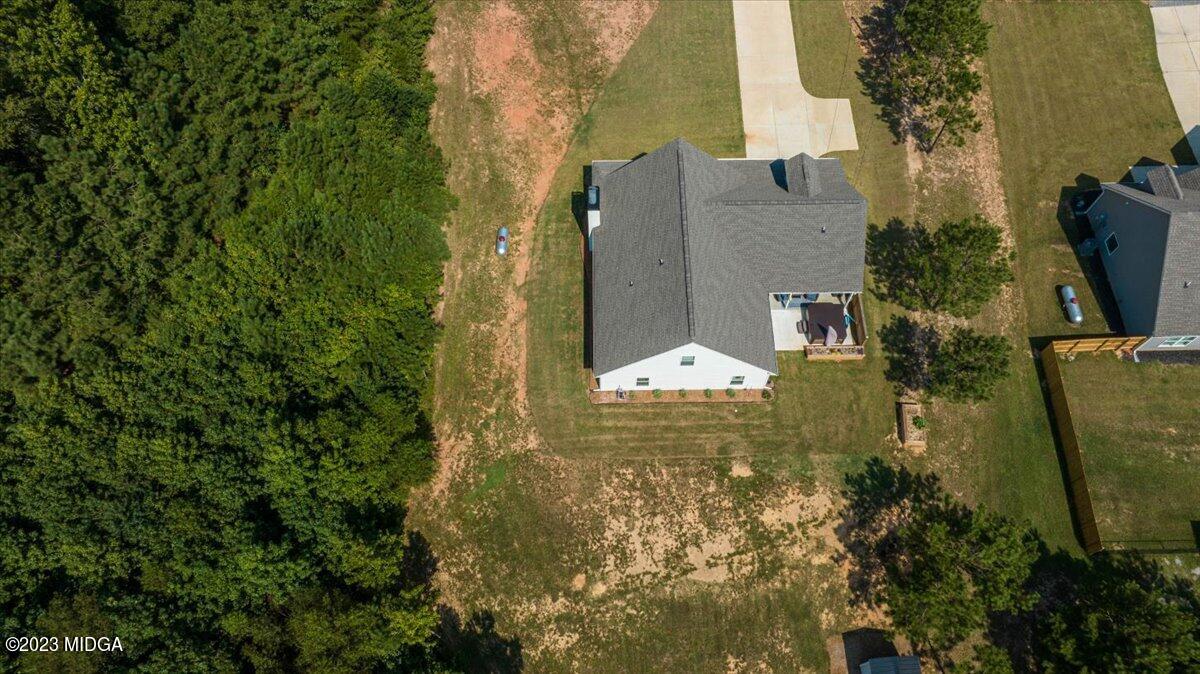 249 Davis Road Gray, GA 31032 - Photo 45 of 53 a view of a house with a yard