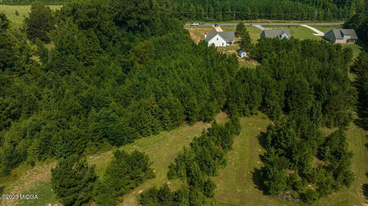 249 Davis Road Gray, GA 31032 - Photo 47 of 53 a view of a lake view with a garden