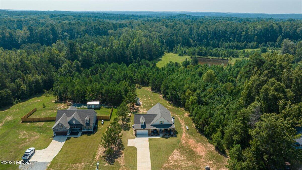 249 Davis Road Gray, GA 31032 - Photo 49 of 53 an aerial view of residential house with outdoor space and trees all around