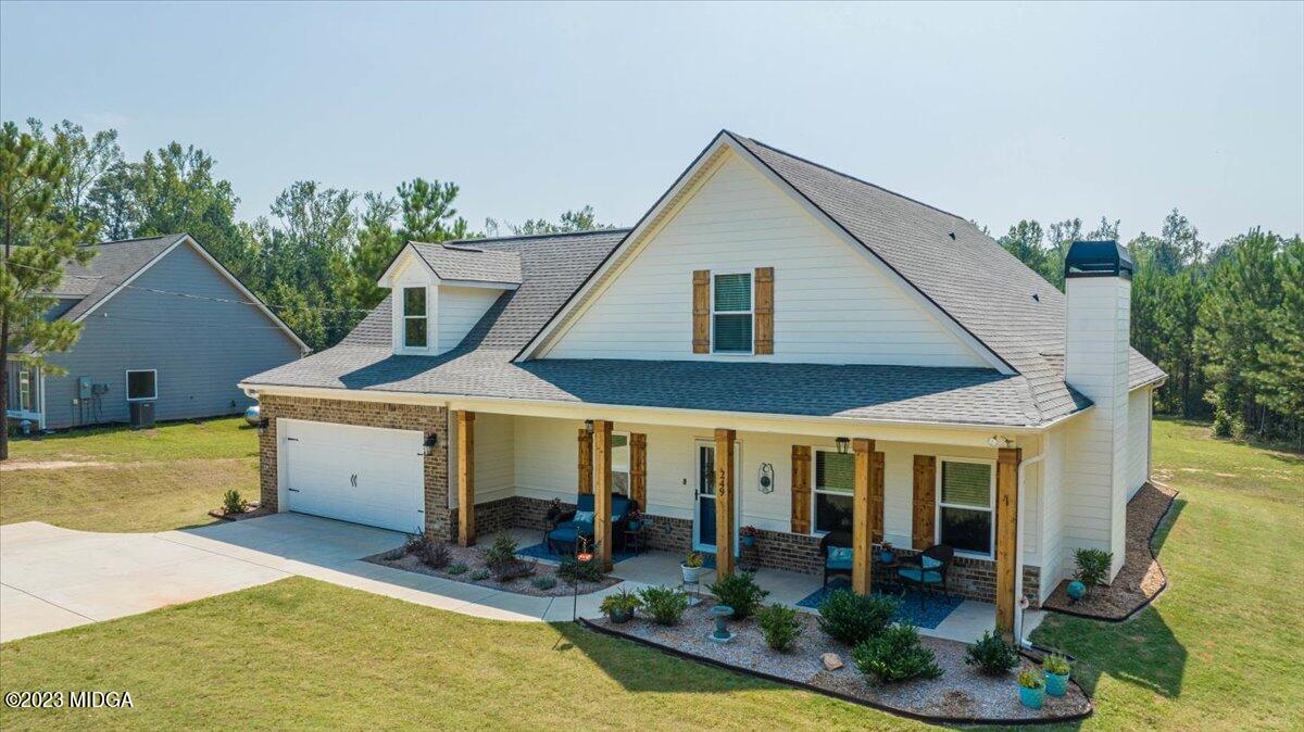 249 Davis Road Gray, GA 31032 - Photo 51 of 53 a front view of a house with garden
