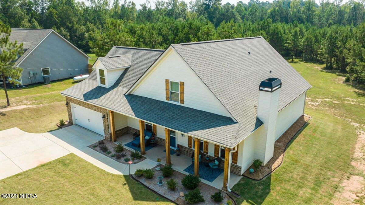 249 Davis Road Gray, GA 31032 - Photo 53 of 53 a aerial view of a house with swimming pool and next to yard
