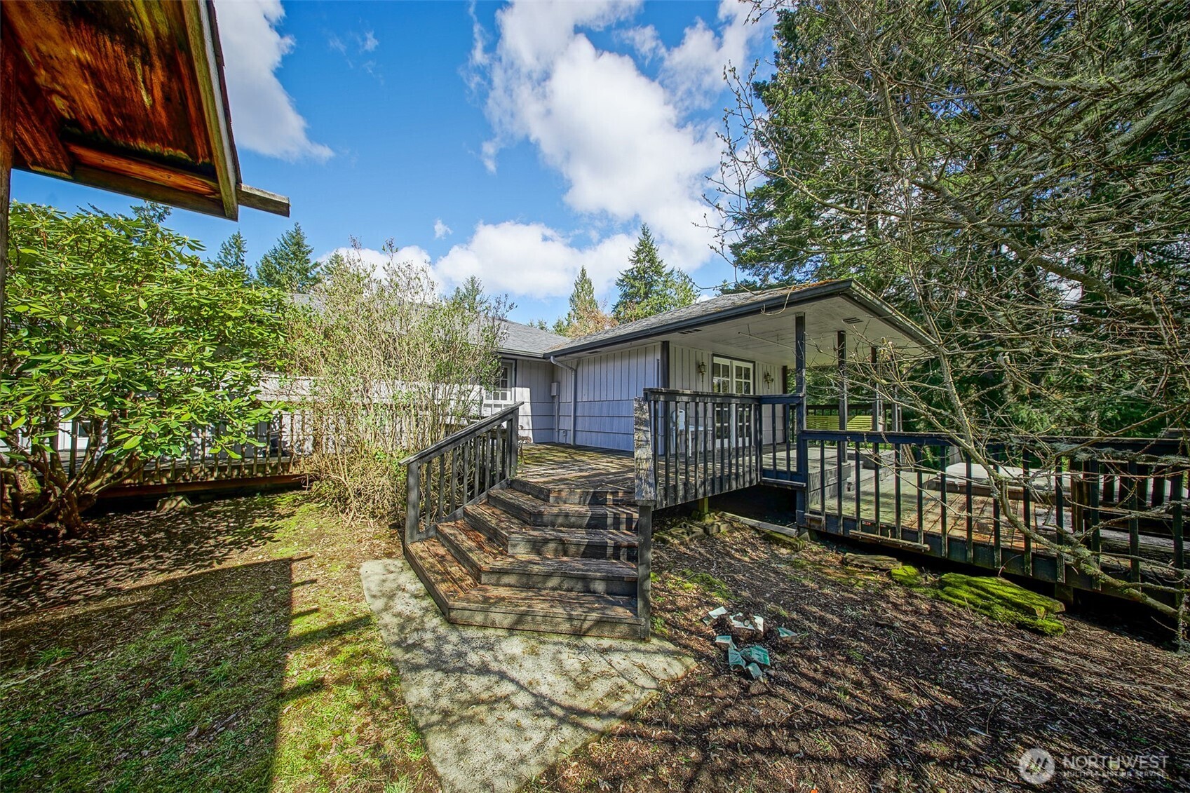4110 Baker Ames Road Northeast Olympia, WA 98506 - Photo 13 of 40 a view of a house with wooden fence