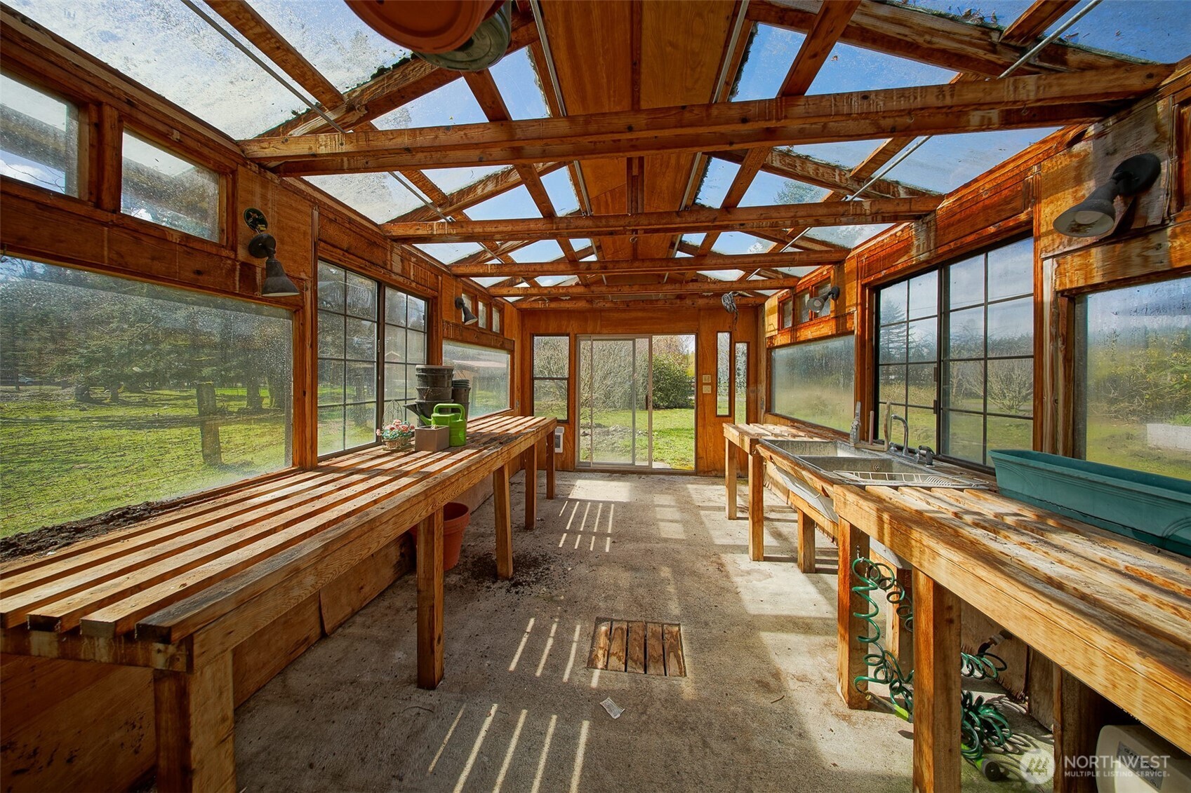4110 Baker Ames Road Northeast Olympia, WA 98506 - Photo 14 of 40 a view of a backyard with seating space