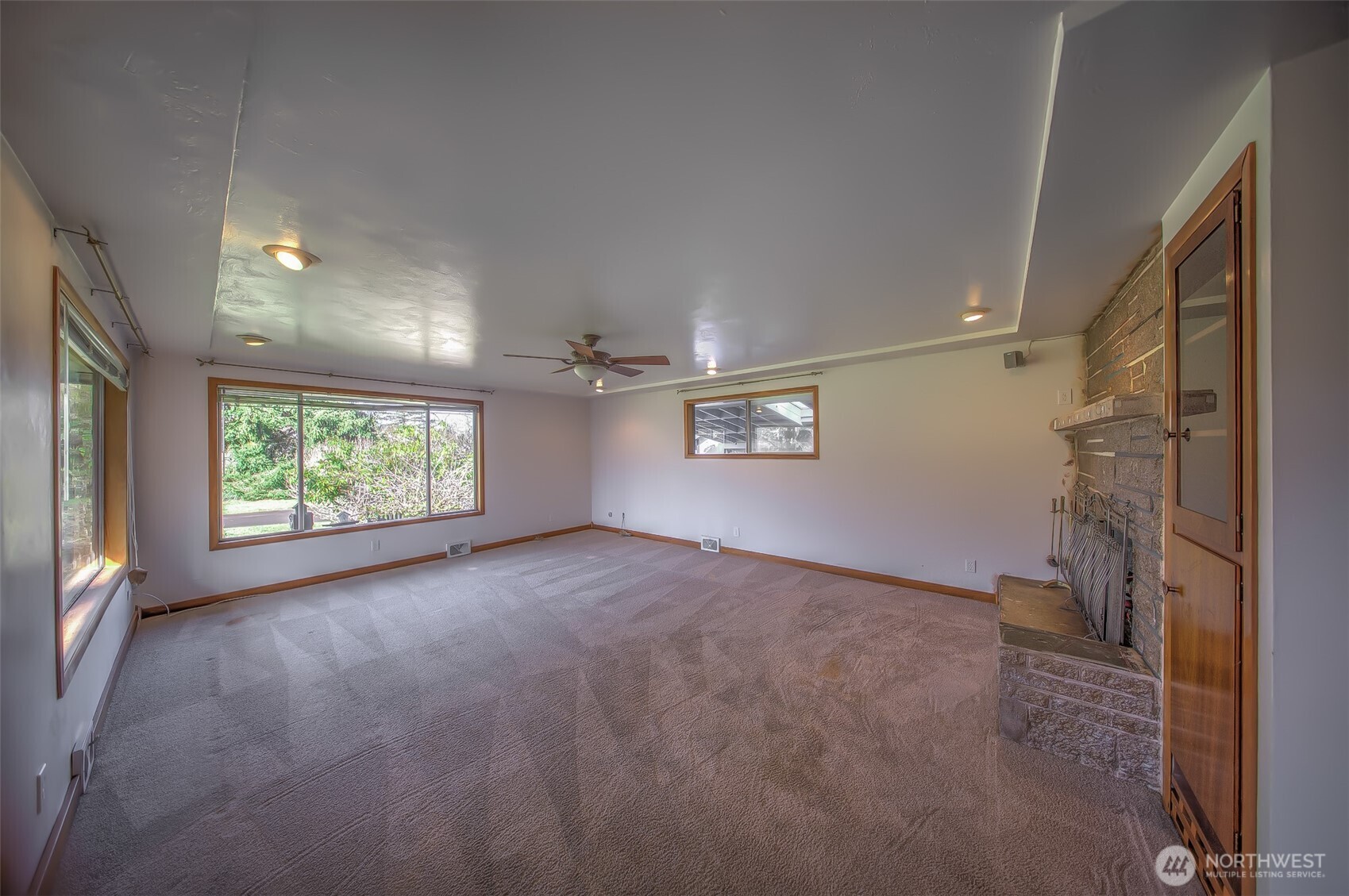 4110 Baker Ames Road Northeast Olympia, WA 98506 - Photo 18 of 40 an empty room with windows