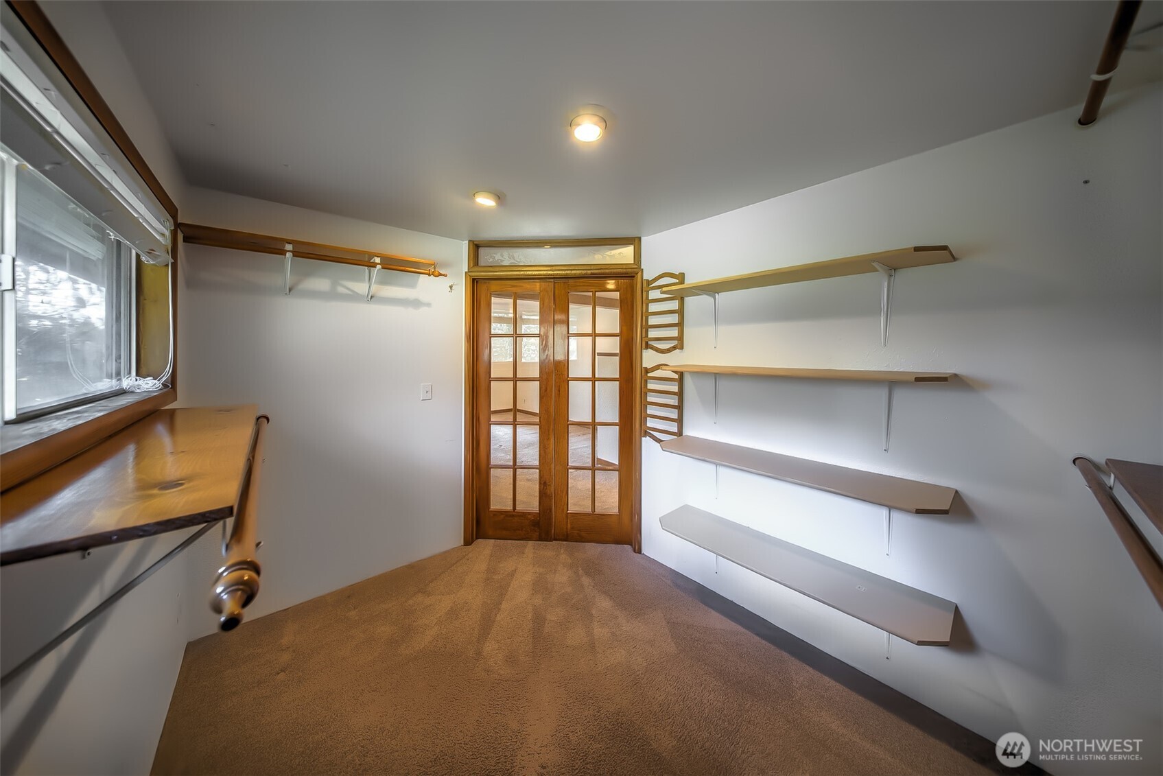 4110 Baker Ames Road Northeast Olympia, WA 98506 - Photo 31 of 40 a view of an empty room with a window