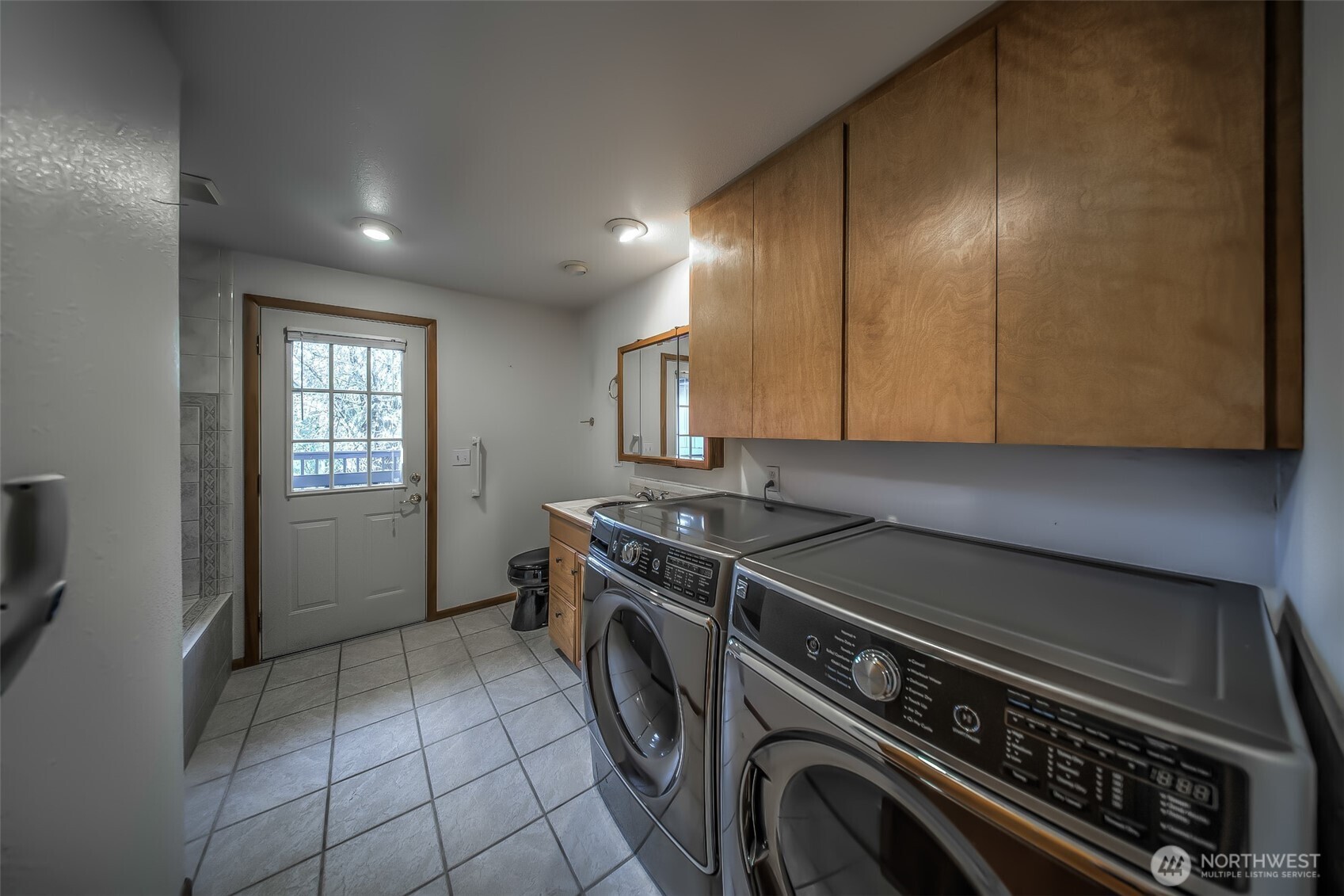 4110 Baker Ames Road Northeast Olympia, WA 98506 - Photo 32 of 40 a kitchen with a stove and a refrigerator