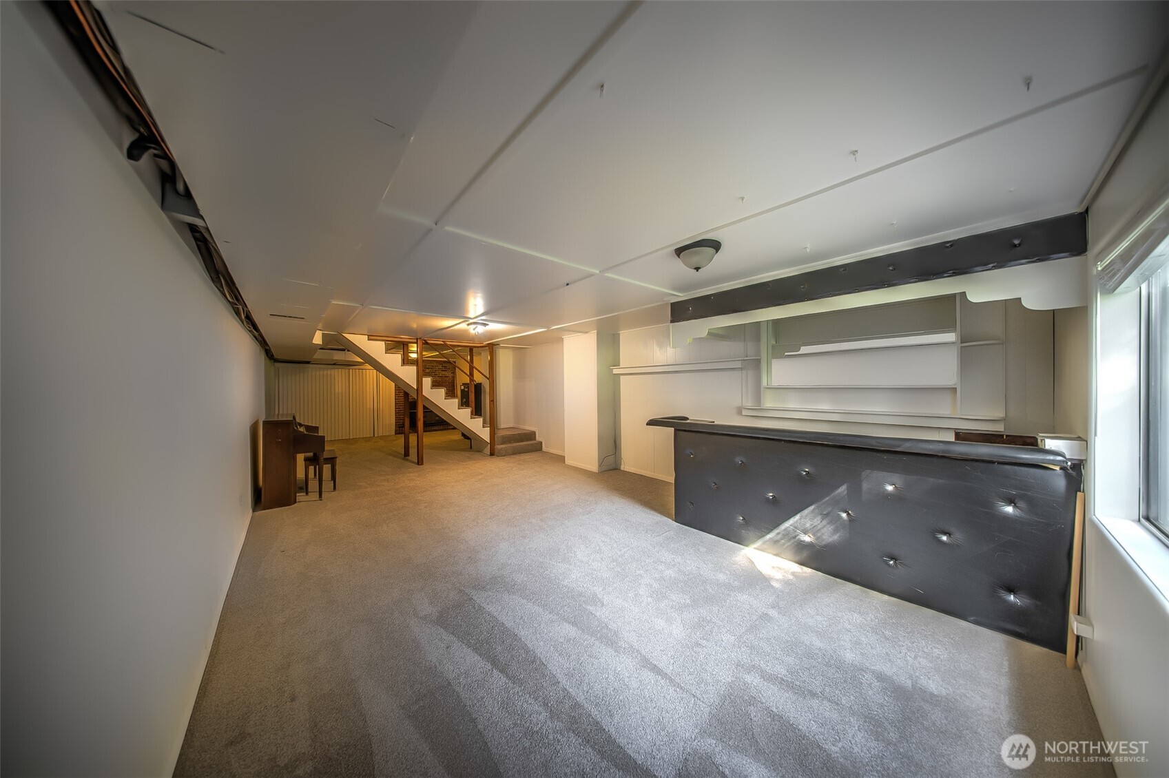 4110 Baker Ames Road Northeast Olympia, WA 98506 - Photo 36 of 40 a view of empty room with stairs and mirrors