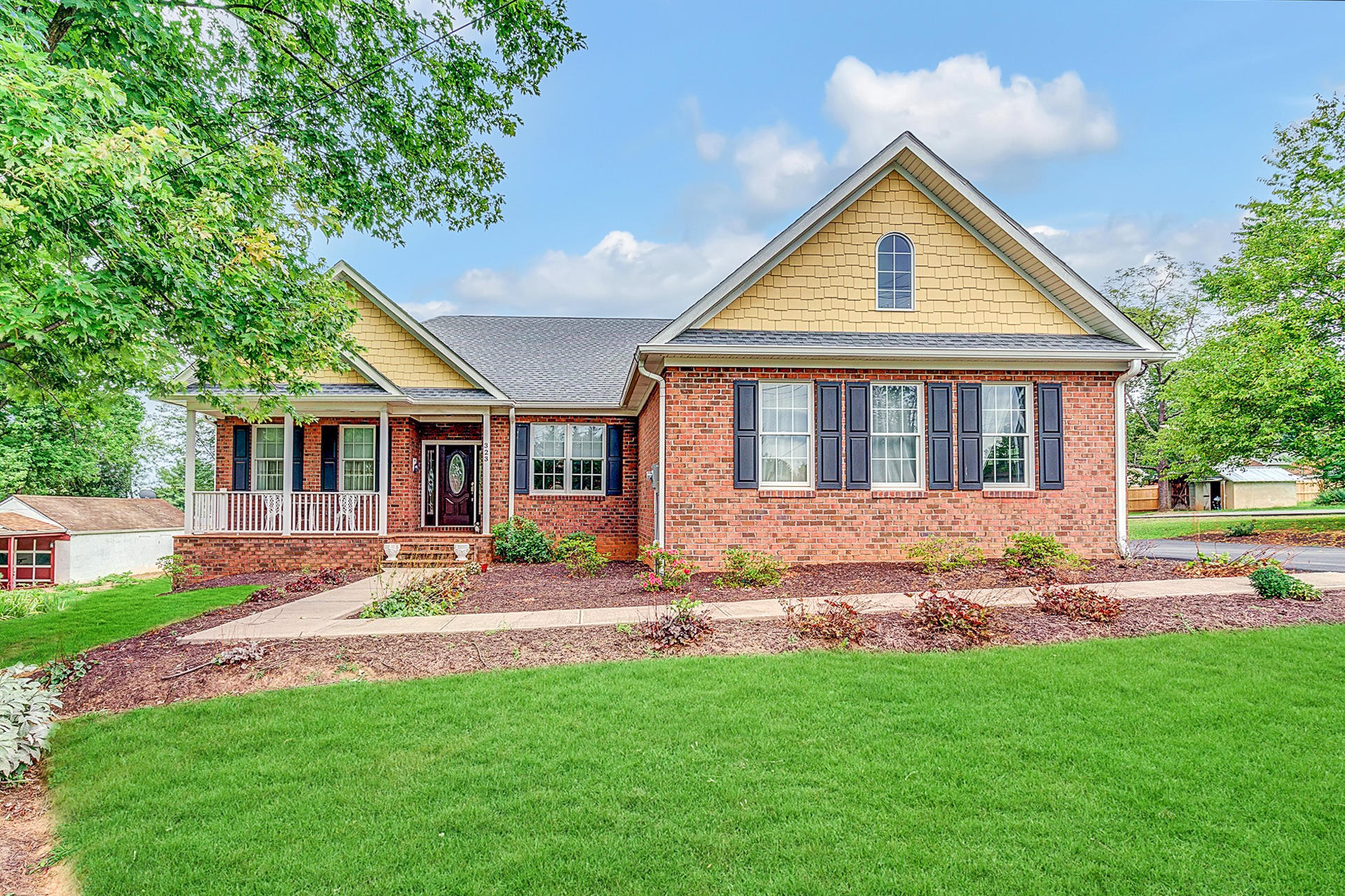 323 Turner Road Salem, VA 24153 - Photo 1 of 37 a front view of a house with a yard