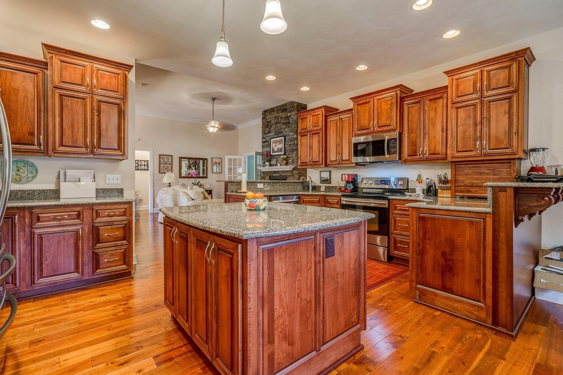 323 Turner Road Salem, VA 24153 - Photo 12 of 37 a kitchen with stainless steel appliances granite countertop a stove a sink dishwasher and a refrigerator