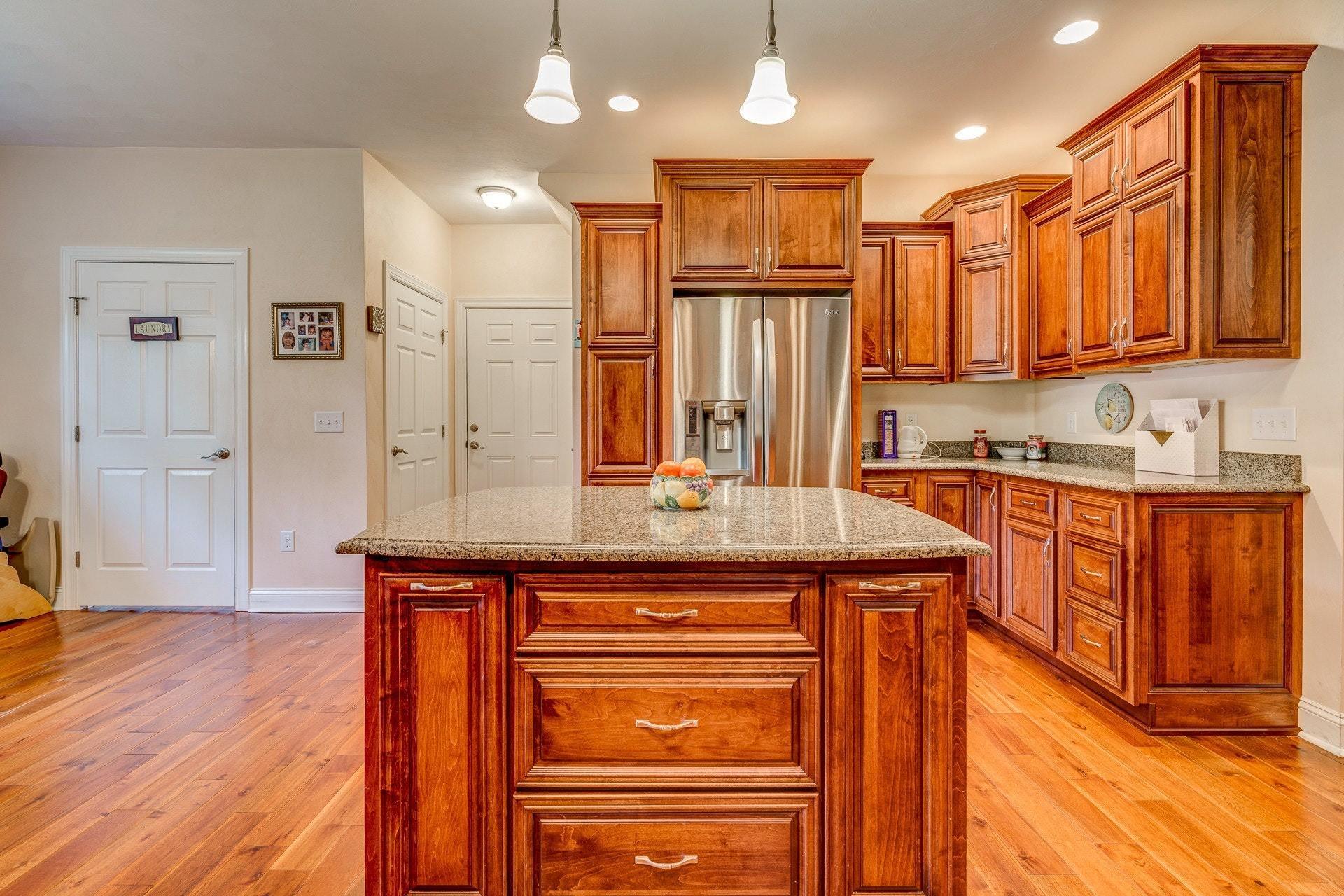 323 Turner Road Salem, VA 24153 - Photo 14 of 37 a kitchen with stainless steel appliances granite countertop a sink and cabinets