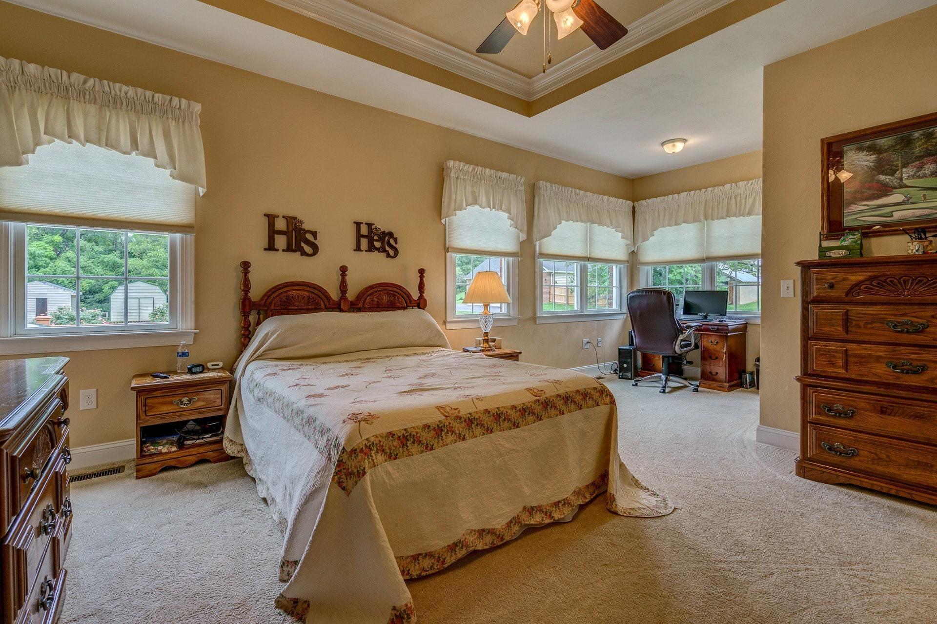 323 Turner Road Salem, VA 24153 - Photo 19 of 37 a bedroom with a bed and a large window