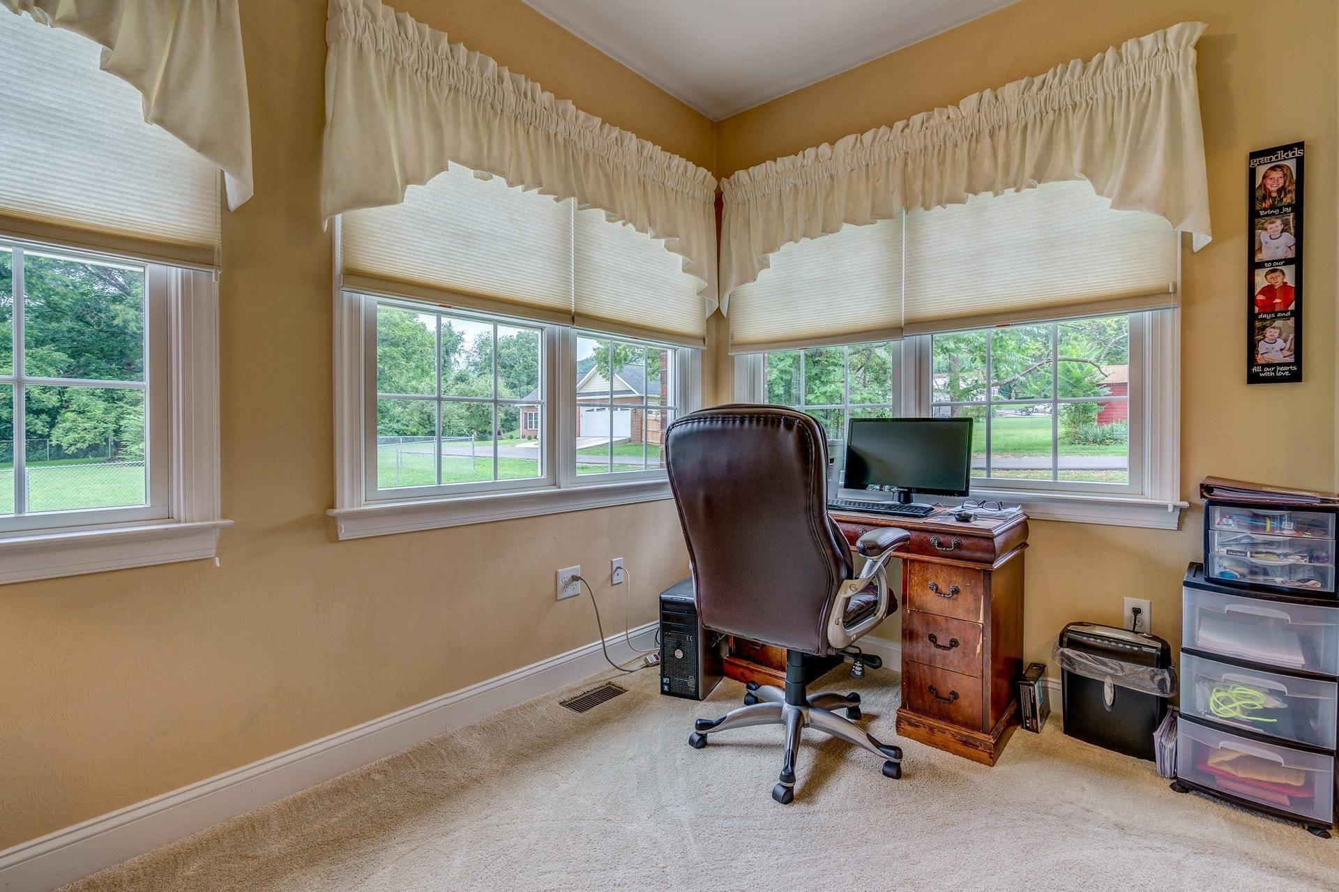 323 Turner Road Salem, VA 24153 - Photo 20 of 37 a view of a workspace with furniture and a window