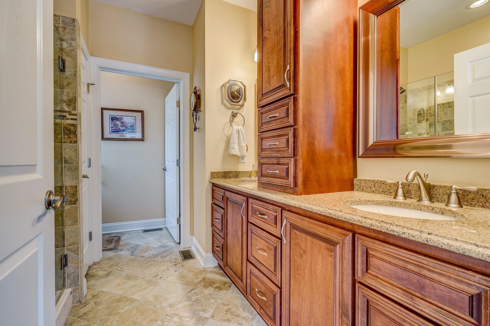 323 Turner Road Salem, VA 24153 - Photo 21 of 37 a bathroom with a granite countertop sink and a mirror
