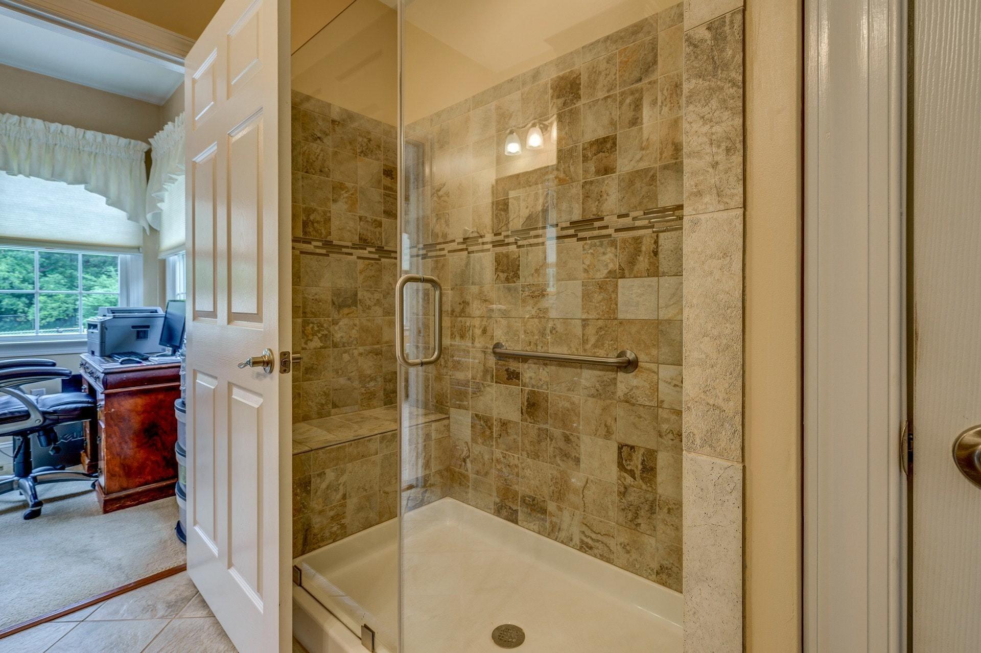 323 Turner Road Salem, VA 24153 - Photo 22 of 37 a bathroom with a bathtub and a shower