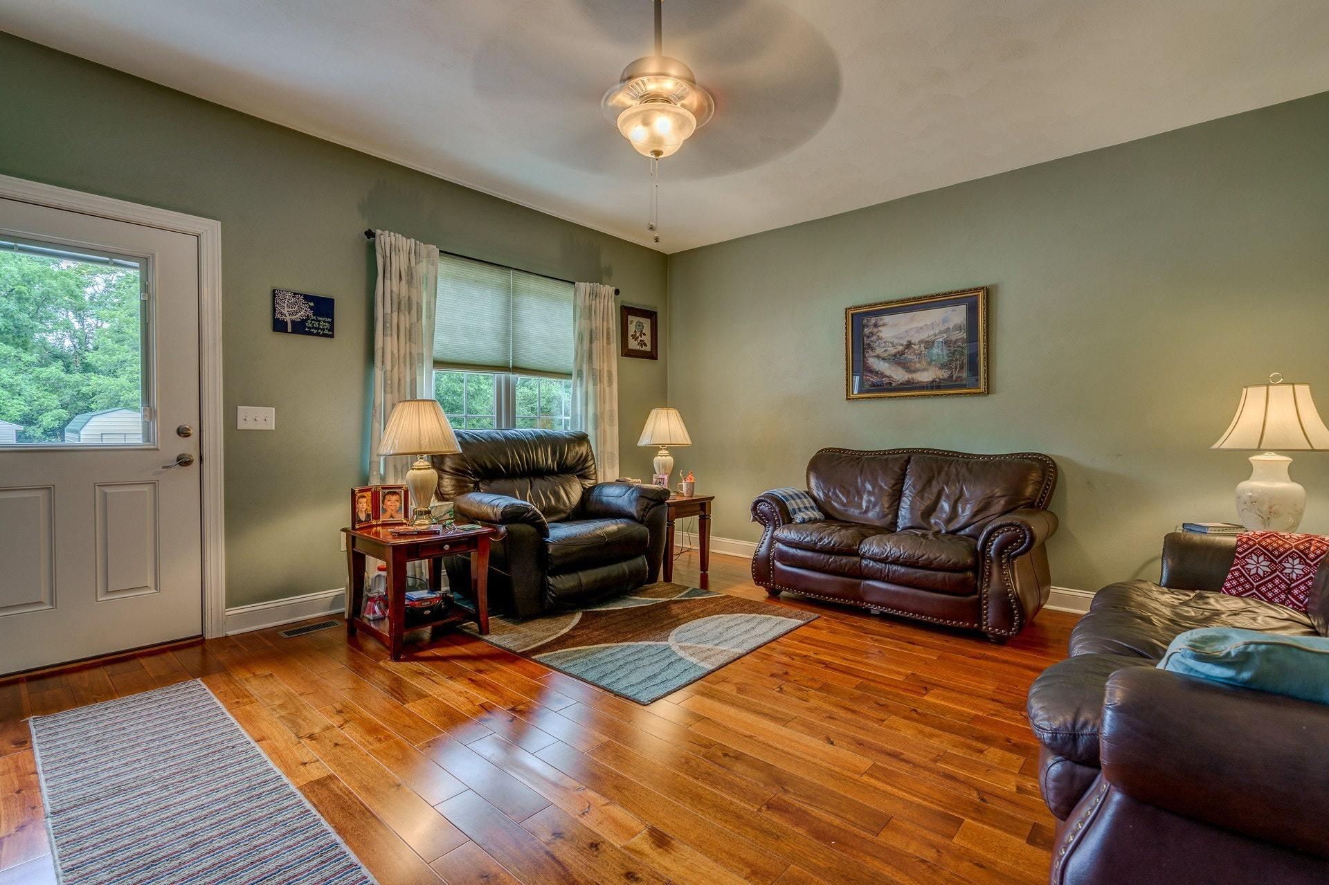 323 Turner Road Salem, VA 24153 - Photo 23 of 37 a living room with furniture a wooden floor and a window
