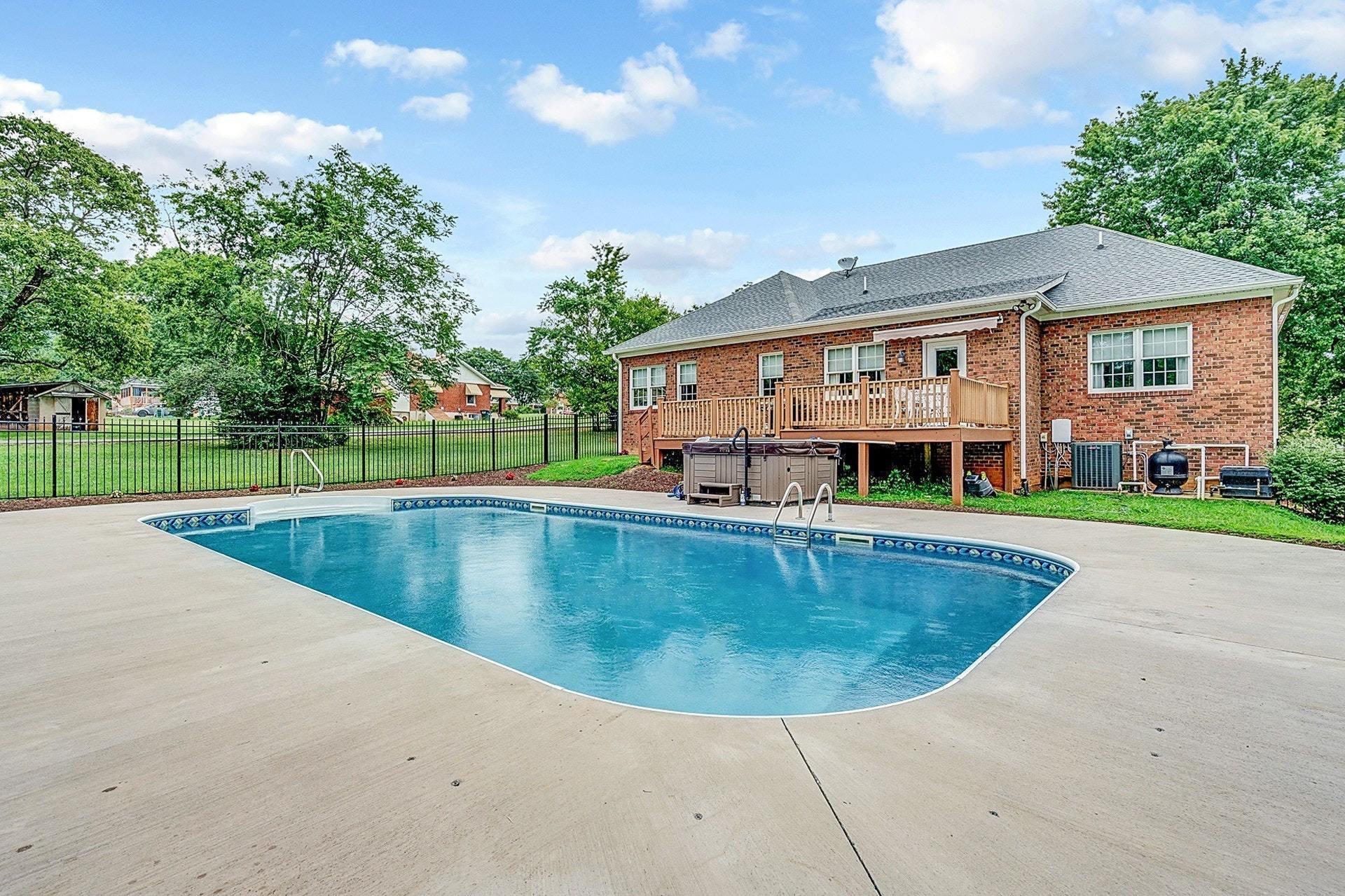 323 Turner Road Salem, VA 24153 - Photo 28 of 37 a view of a house with a swimming pool