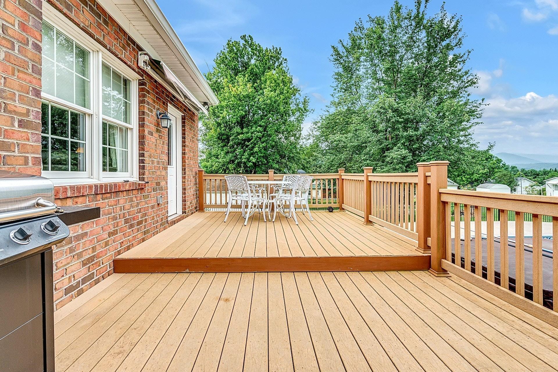 323 Turner Road Salem, VA 24153 - Photo 31 of 37 a view of outdoor space with a large window and wooden floor