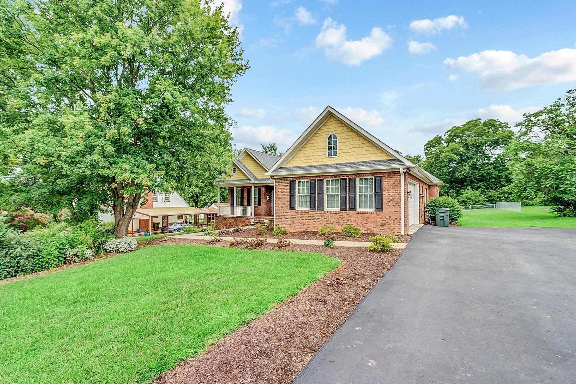 323 Turner Road Salem, VA 24153 - Photo 34 of 37 a front view of a house with a yard and porch