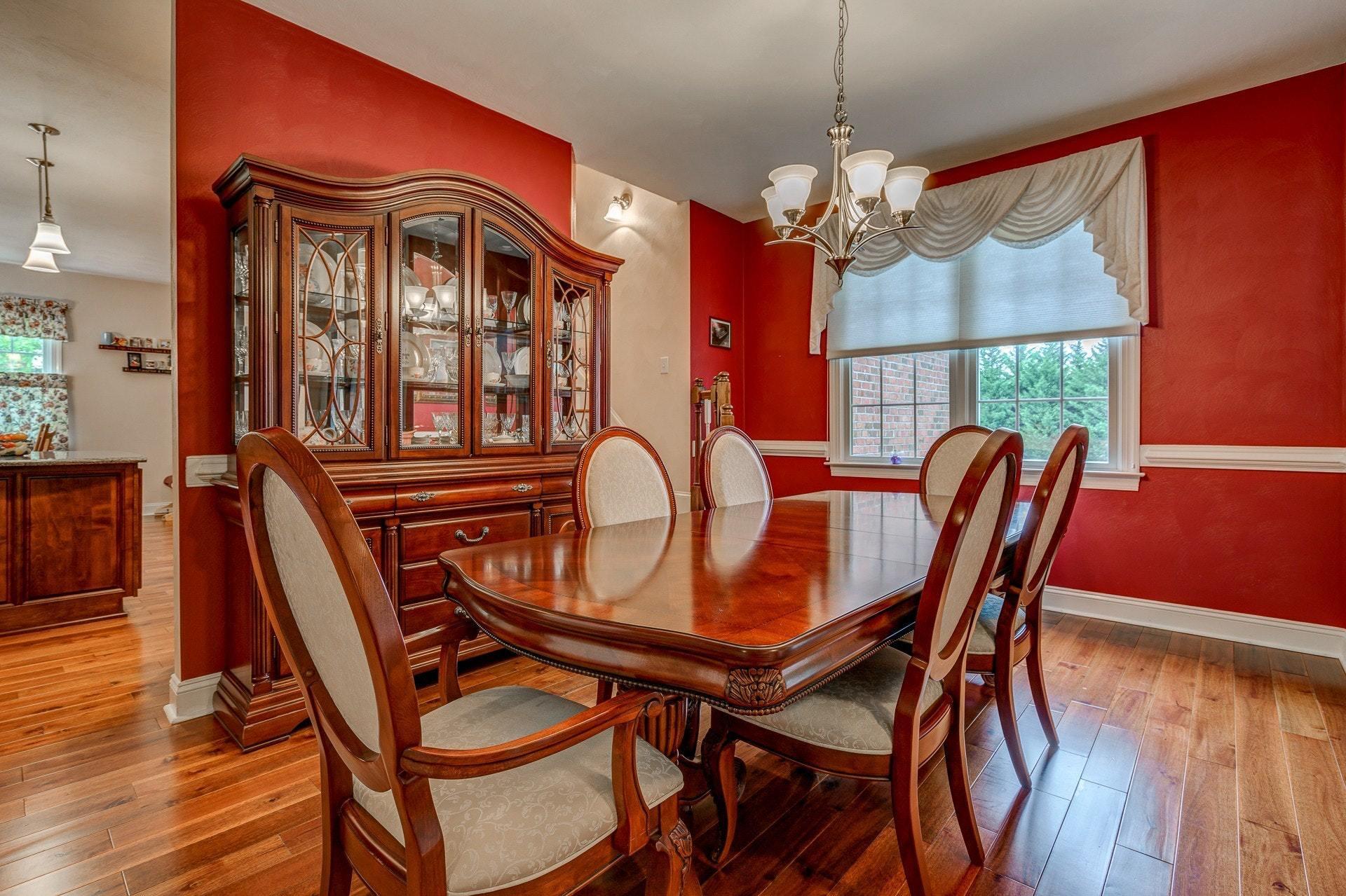 323 Turner Road Salem, VA 24153 - Photo 8 of 37 a dining room with furniture a chandelier and wooden floor