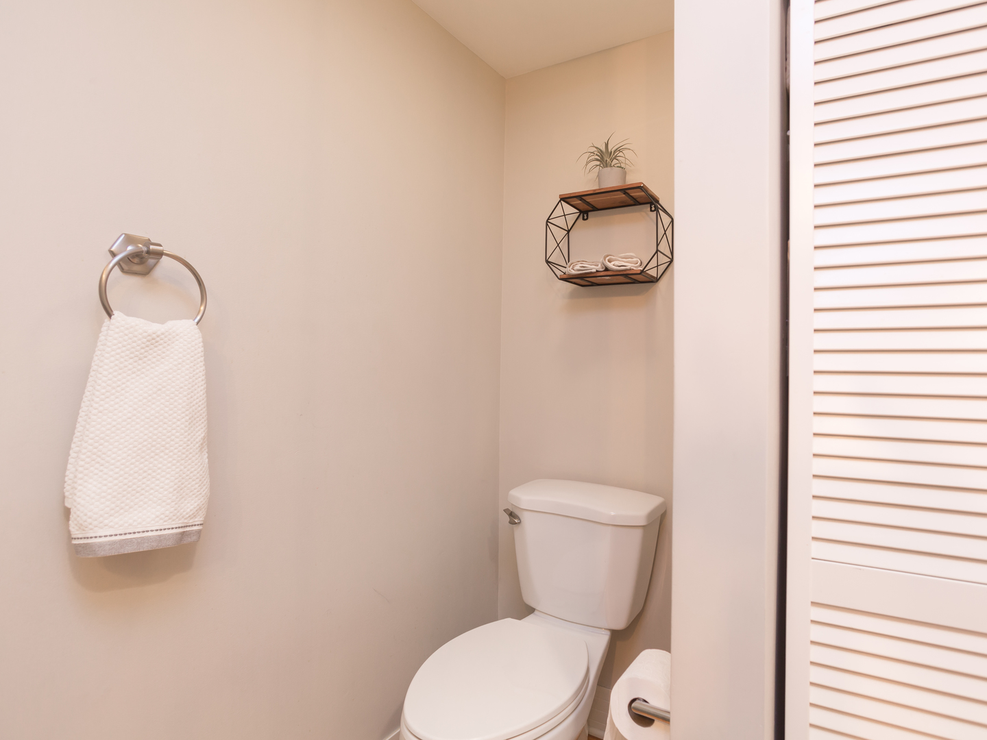 398 Rodenburg Road Roselle, IL 60172 - Photo 21 of 43 a white toilet sitting next to a bathroom sink