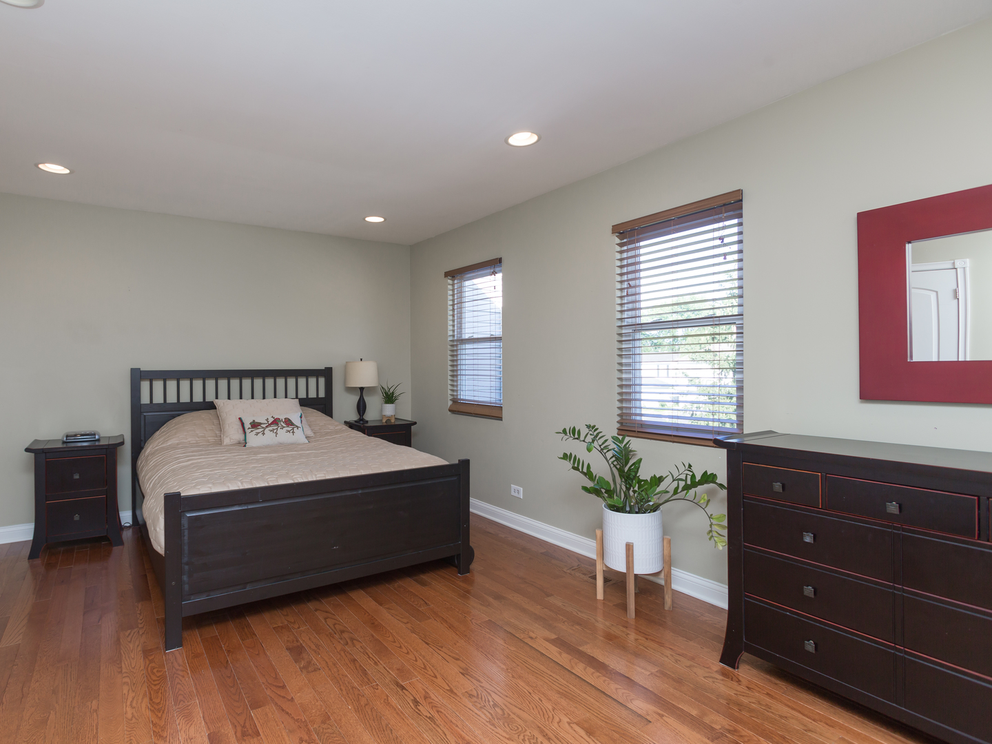 398 Rodenburg Road Roselle, IL 60172 - Photo 27 of 43 a spacious bedroom with a bed and window