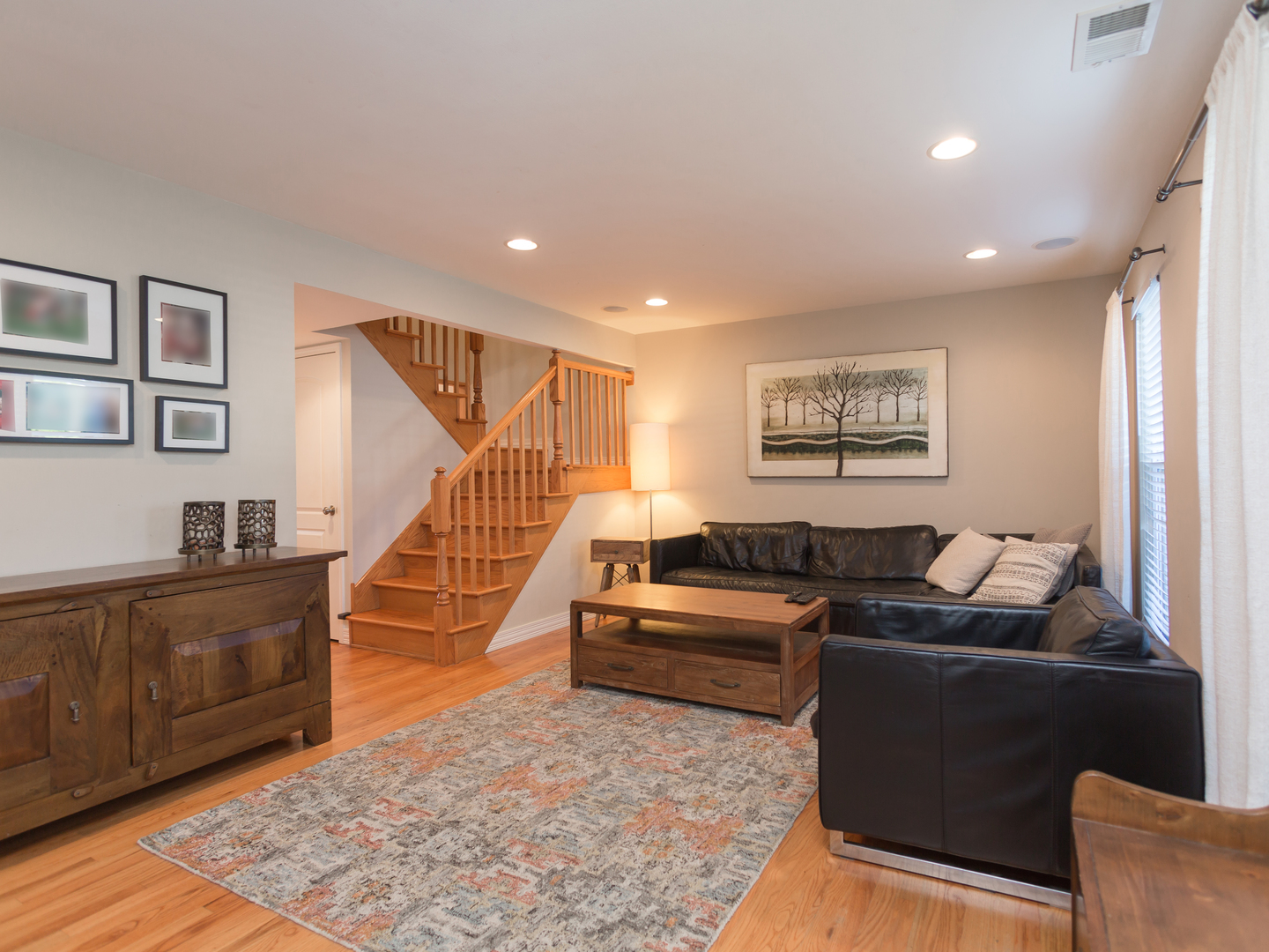 398 Rodenburg Road Roselle, IL 60172 - Photo 3 of 43 a living room with furniture and a rug