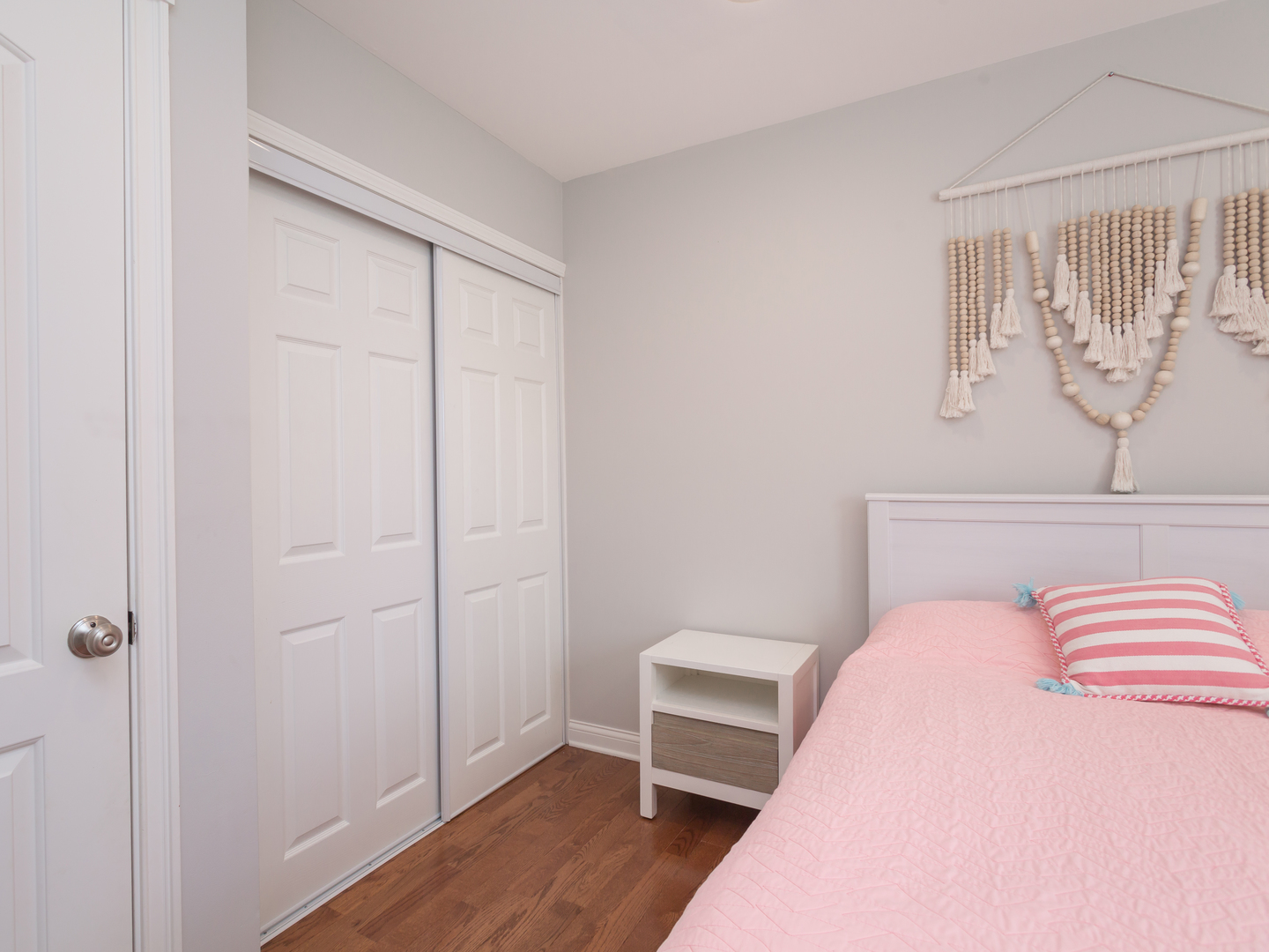 398 Rodenburg Road Roselle, IL 60172 - Photo 31 of 43 a bedroom with a bed and wooden floor