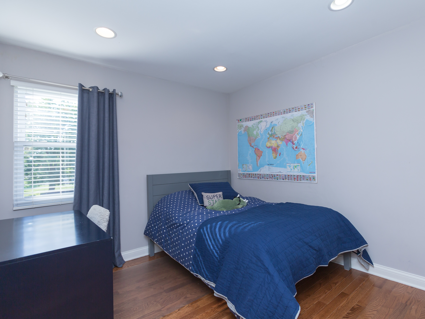 398 Rodenburg Road Roselle, IL 60172 - Photo 32 of 43 a bedroom with a bed and a large window
