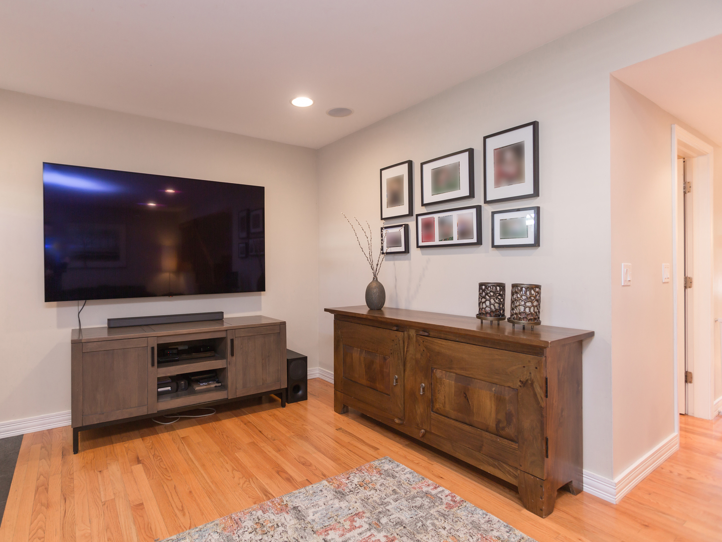 398 Rodenburg Road Roselle, IL 60172 - Photo 10 of 43 a living room with furniture and a flat screen tv