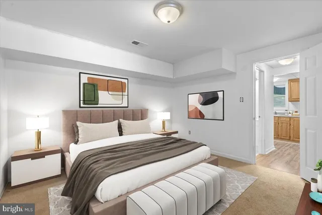 a bathroom with a toilet and a bathtub