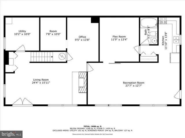 a front view of a house with swimming pool and trees