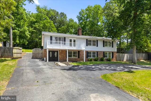 a picture of a bench in front of a window