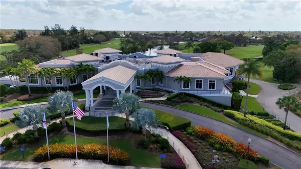 an aerial view of house with a garden